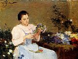 Victor Gabriel Gilbert Famous Paintings - Arranging Flowers For A Spring Bouquet